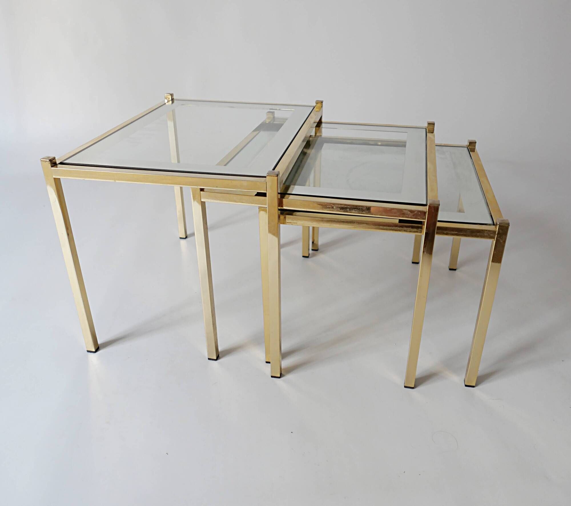 nesting tables in gold metal and mirror vintage 1970s design