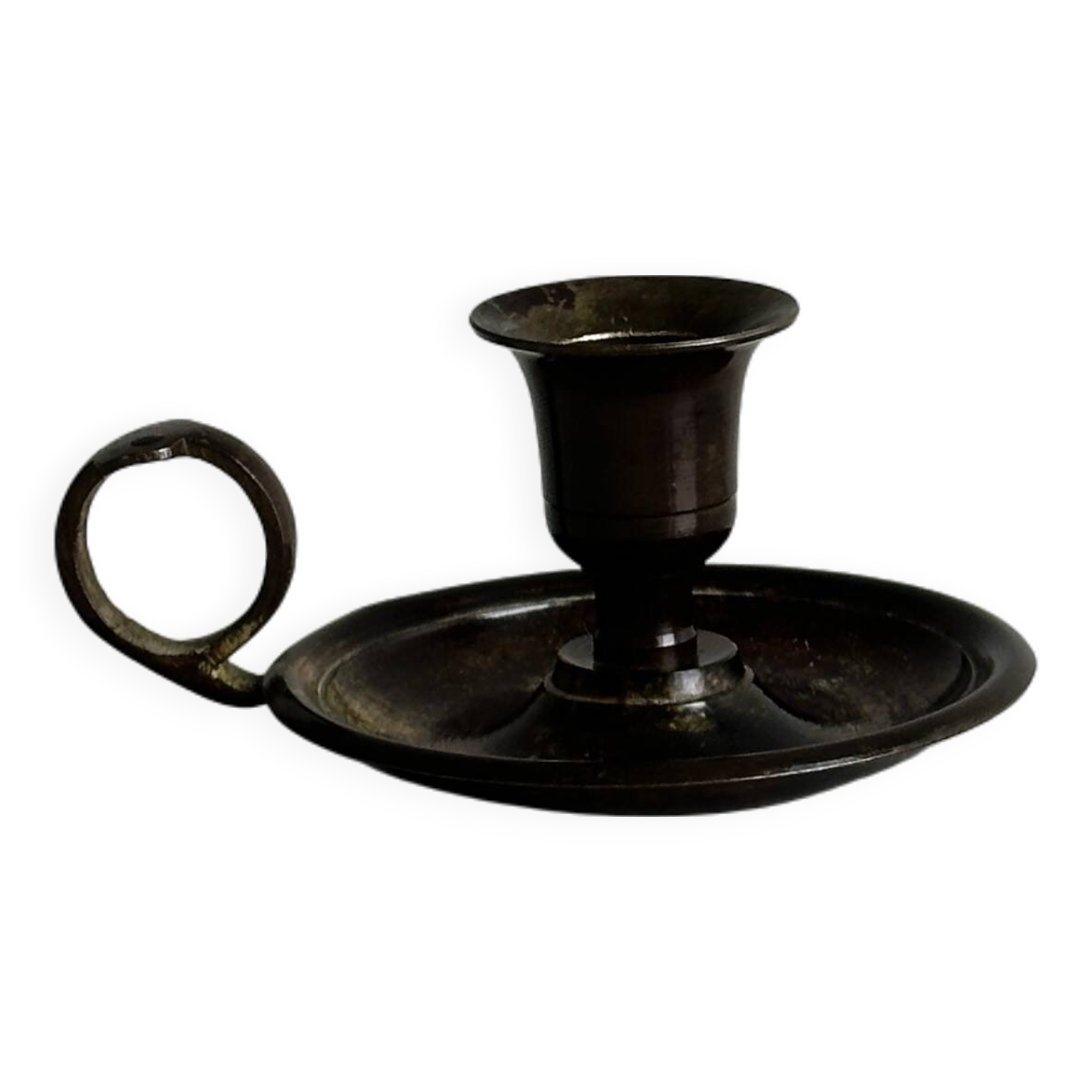 Small antique candle holder in patinated metal