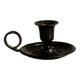 Small antique candle holder in patinated metal