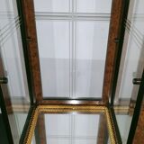 Wooden showcase and gilded motifs 1970
