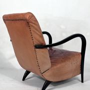 Sculptural Italian Mid-century leather and curved wood armchair from 50s