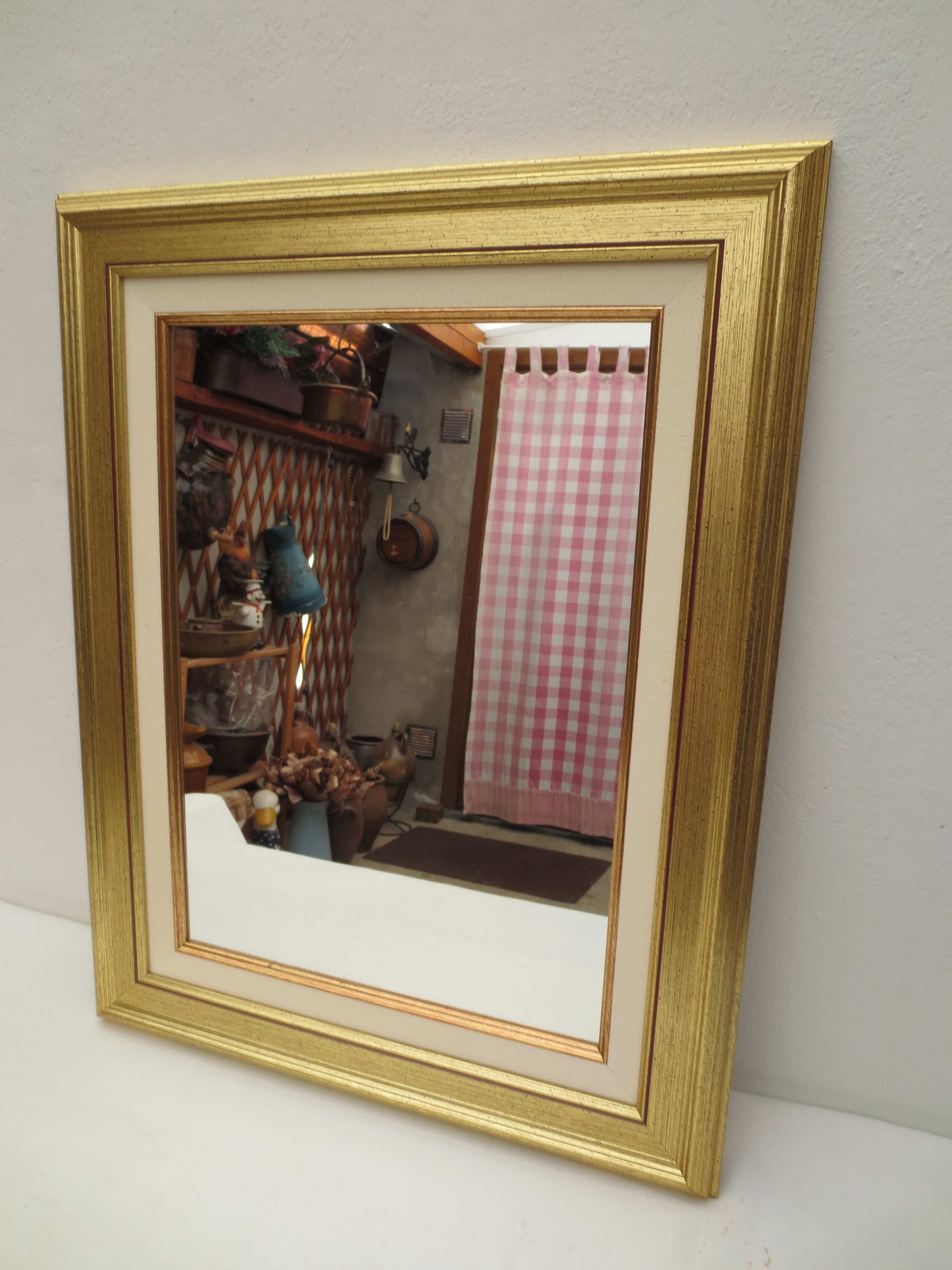 Rectangular mirror, gilded wood tower