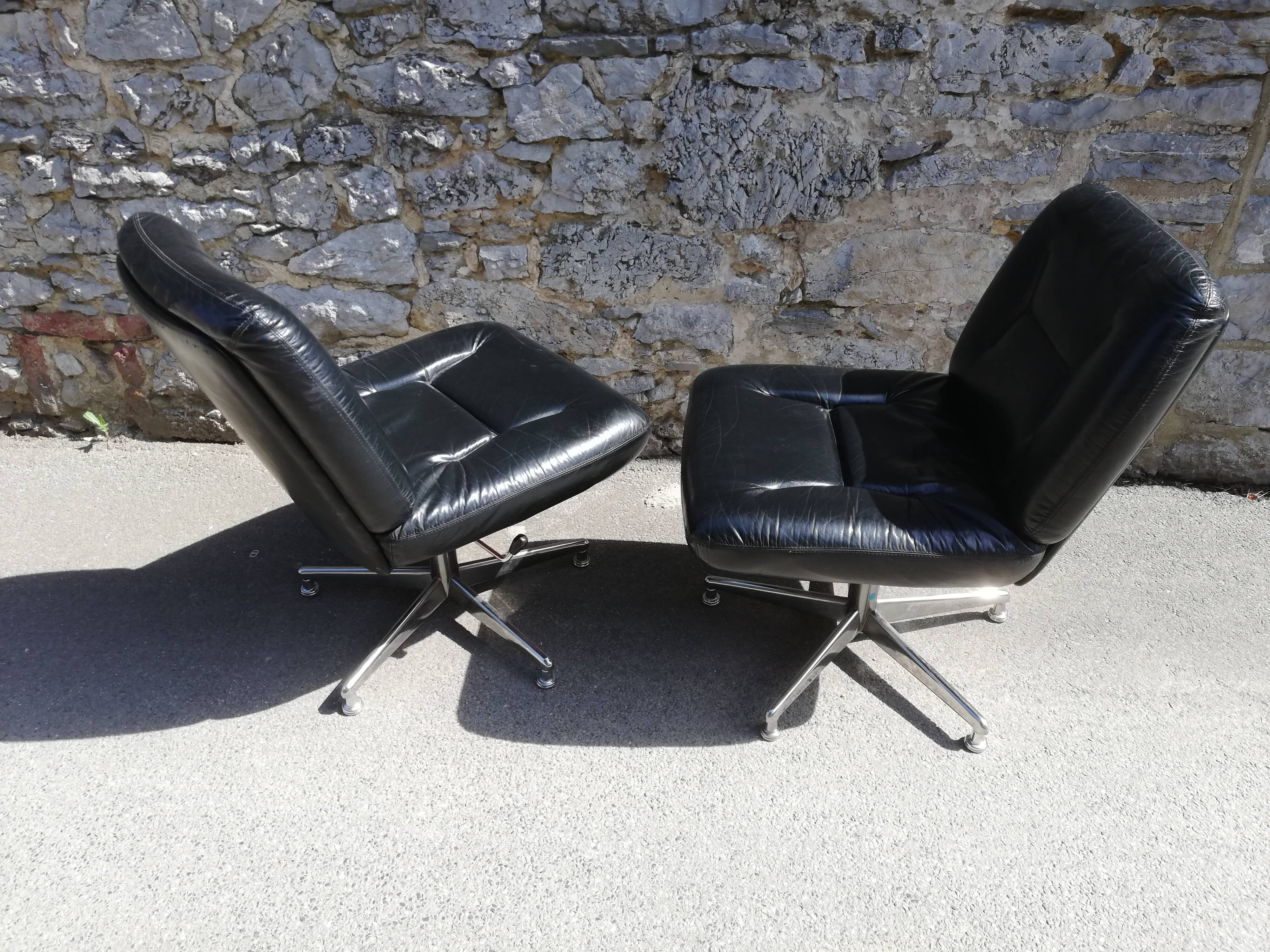 Pair of black leather office armchairs, 1970