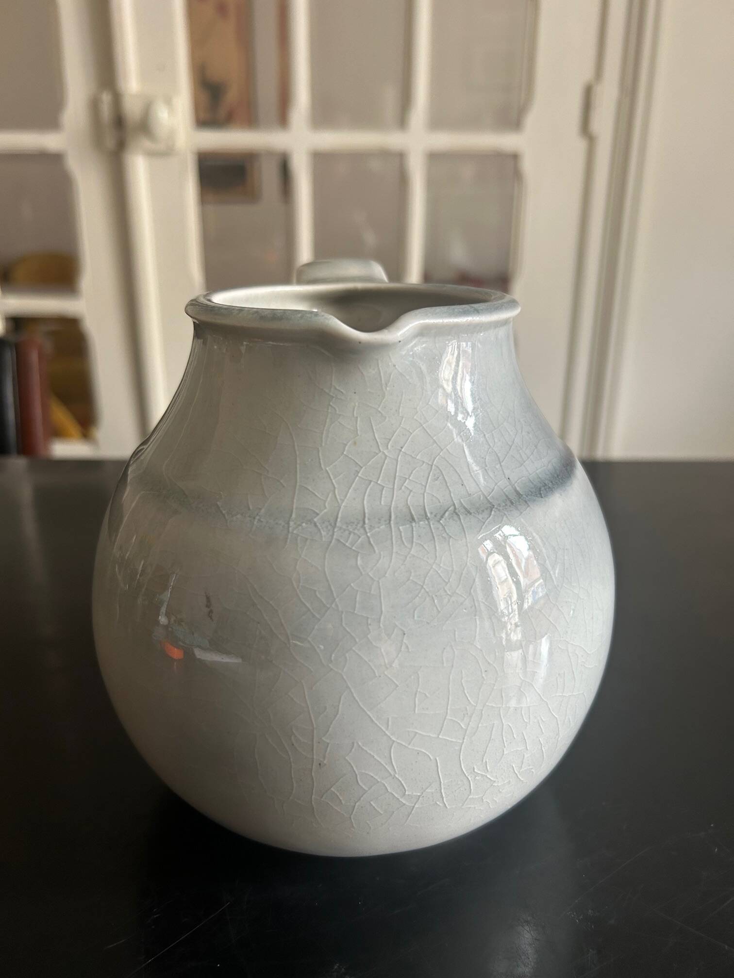 large blue ceramic pitcher