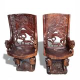 Pair of carved African armchairs