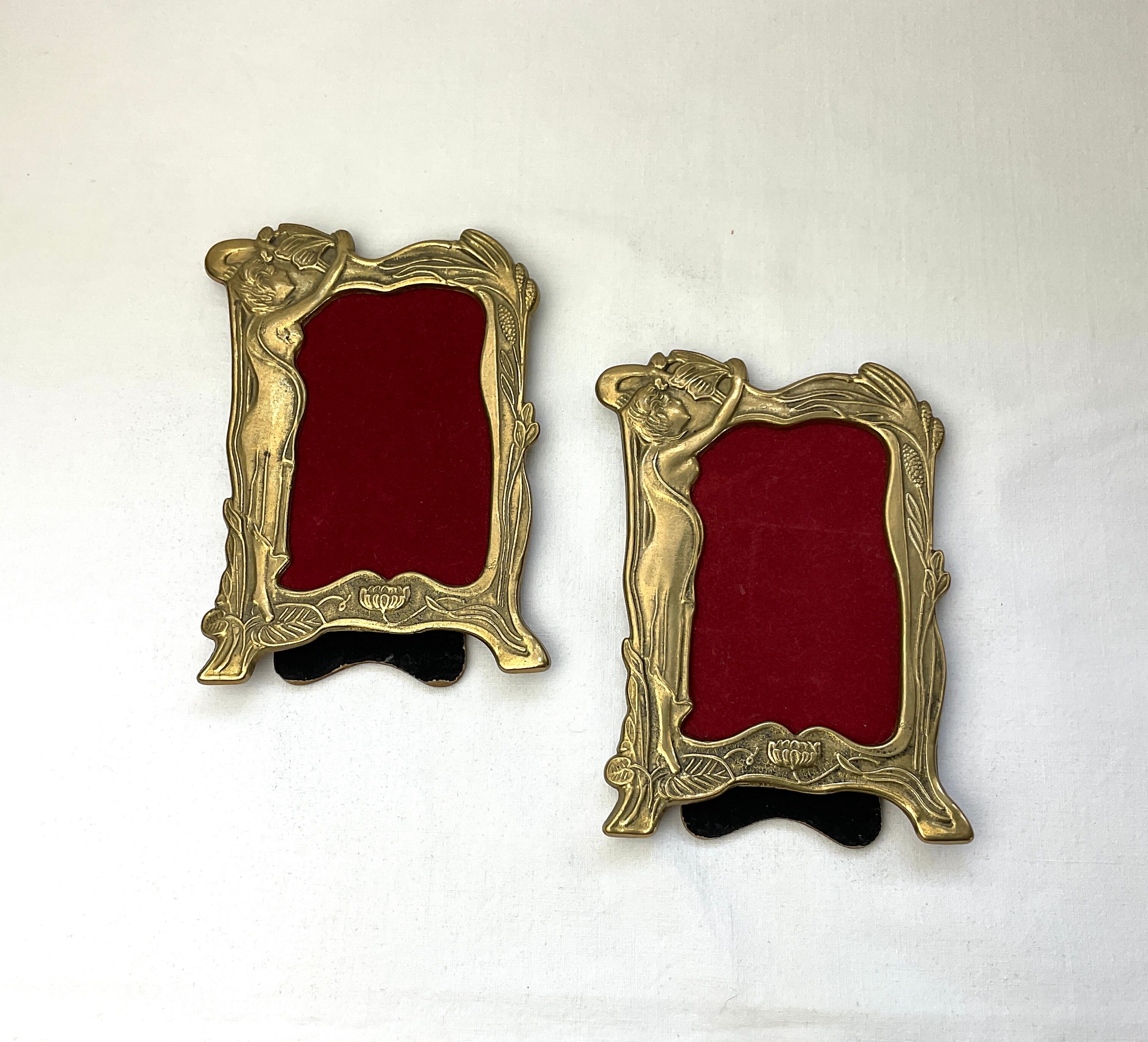 Pair of brass frames with Art Nouveau style woman