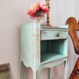 Patinated bedside table end of sofa