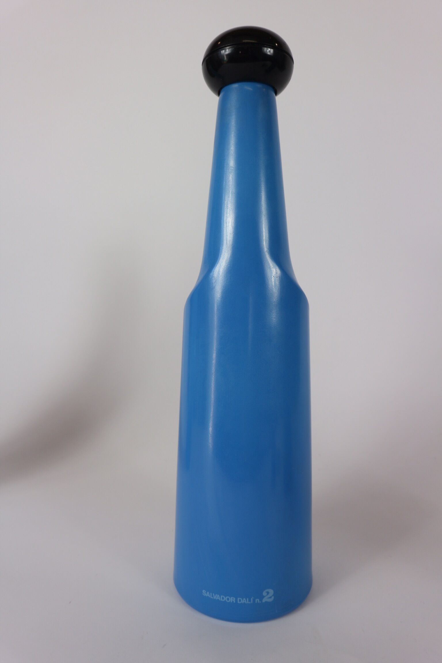 three blue bottles by Salvador Dali for Rosso Antico