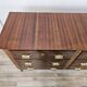 1950s Art Decò walnut burl and brass chest of drawers