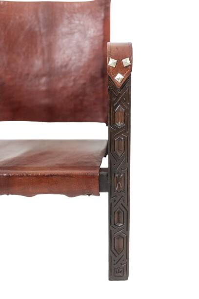 “Safari” armchair in wood and cognac leather. 1960s/70s.