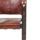 “Safari” armchair in wood and cognac leather. 1960s/70s.