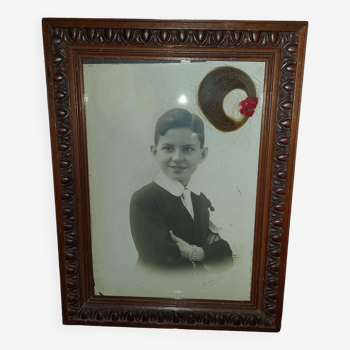 Old framed photo portrait young boy wooden frame