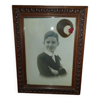 Old framed photo portrait young boy wooden frame