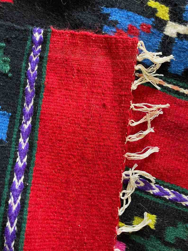 Romanian wool rug, red background with delicate colourful flowers
