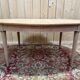 Oval Louis XVI dining table in cherry wood.