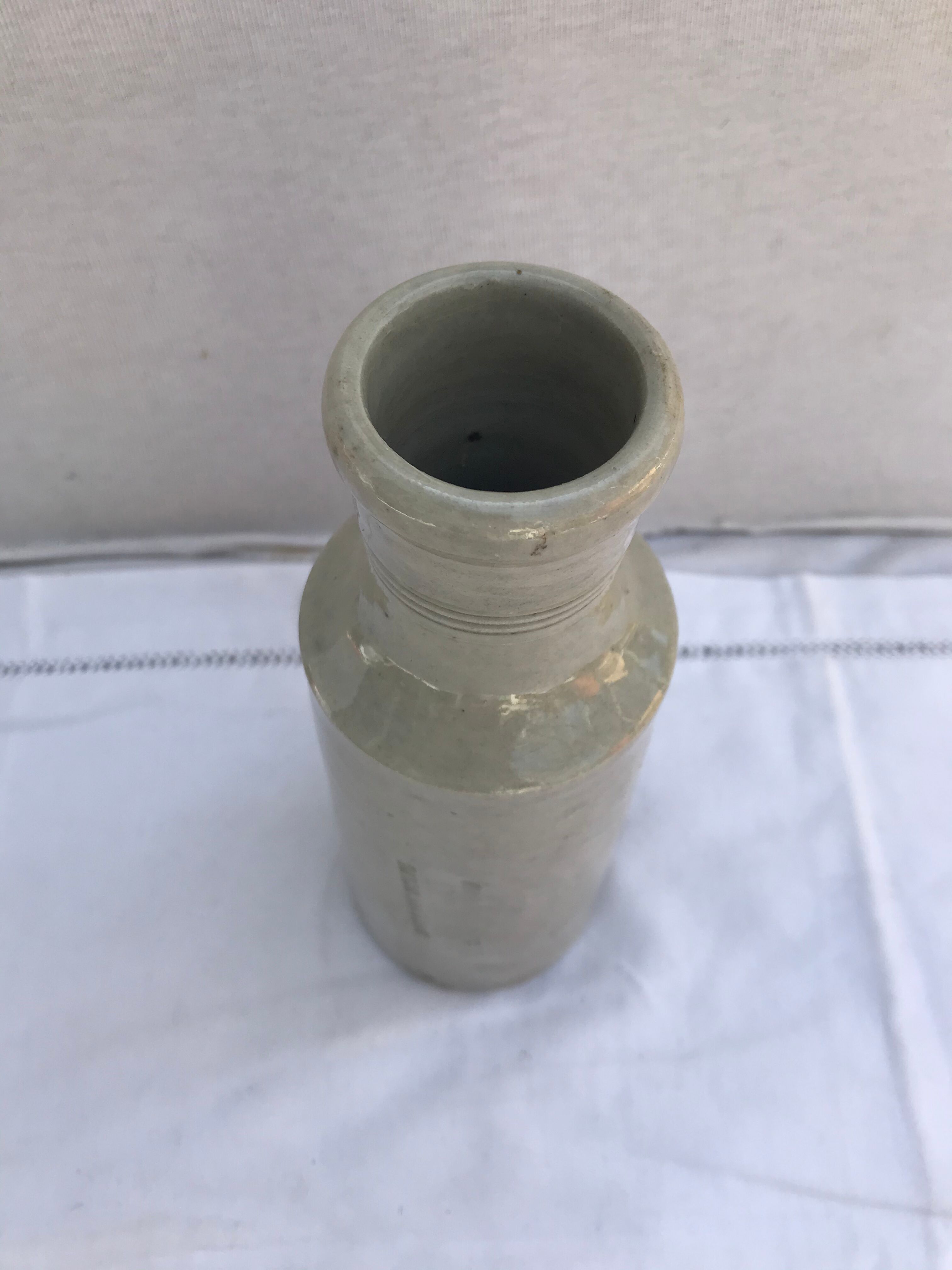 Old ceramic bottle beige Fourgault Courbevoie Paris vintage