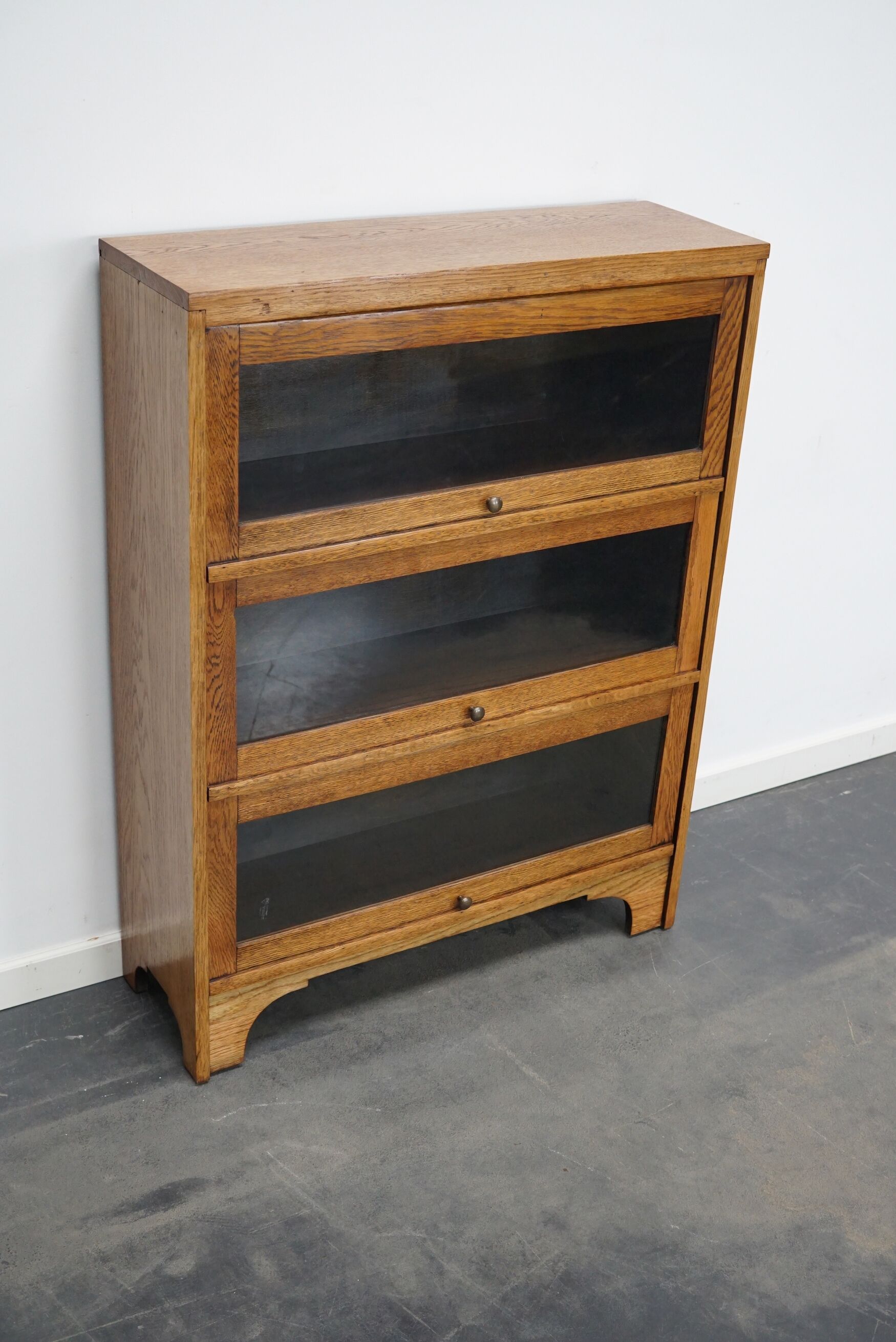 German Oak Bookcase with Folding Doors In Style of Globe Wernicke, ca 1930s