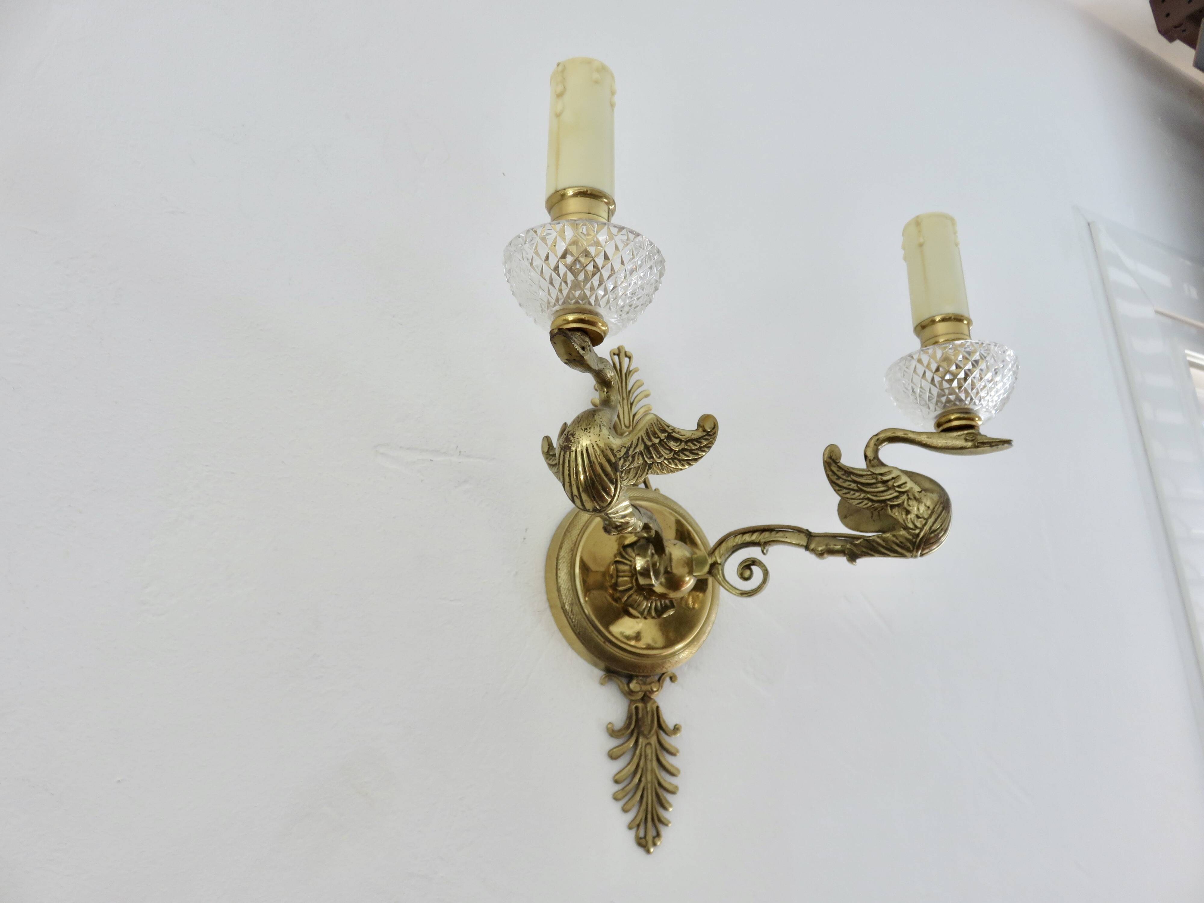 Pair of Lucien Gau "swan" wall lights in gilded bronze with bright gold and crystal
