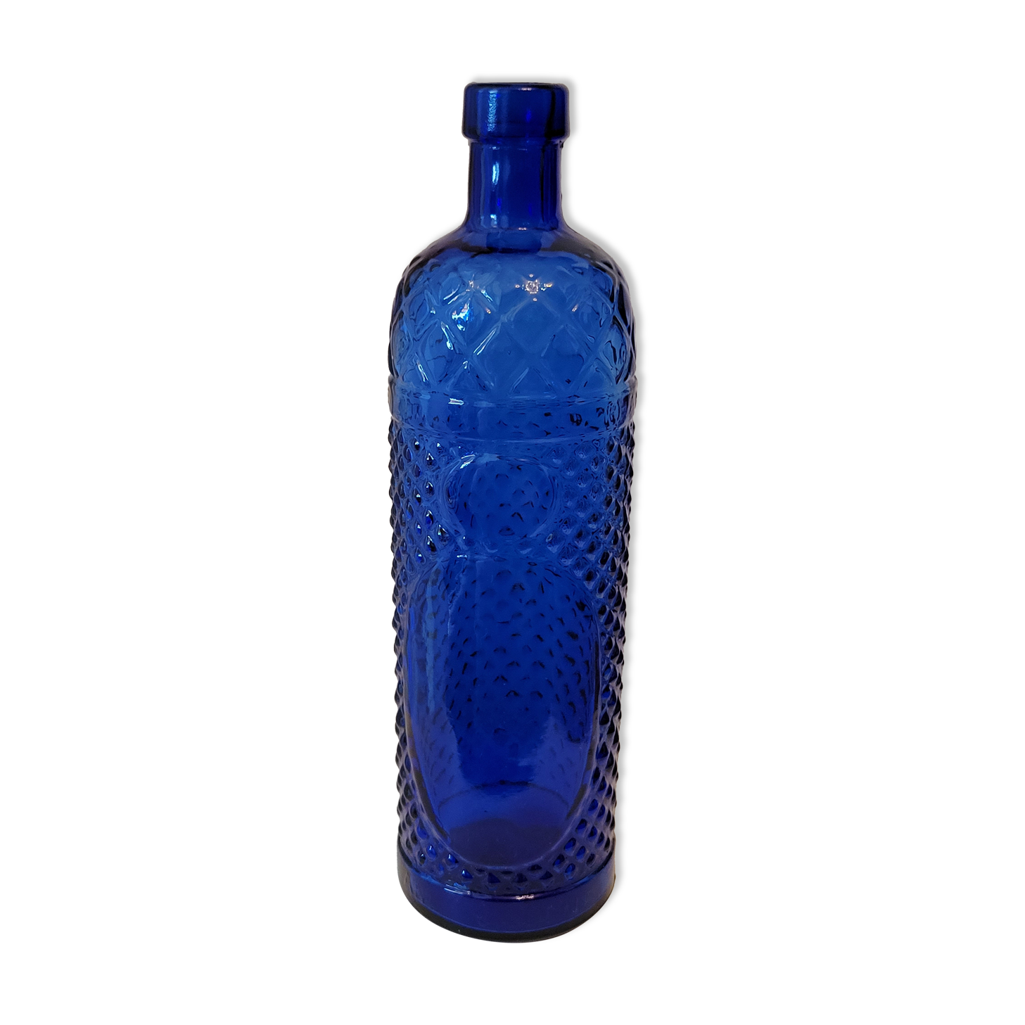 Vintage decanter bottle made of blue molded pressed glass
