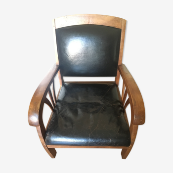 Fauteuil cuir et bois années 50