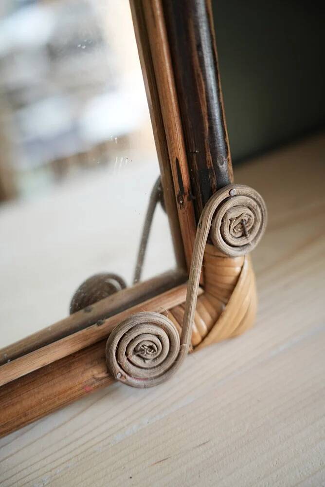 Antique rattan mirror