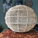 Suspension in raffia