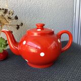 Vintage red teapot with white polka dots