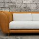 Canapé vintage en rotin design 1970 tissu bouclette écru