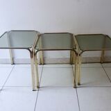 Series of nesting tables in smoked glass & rectangular golden brass