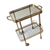 Serving golden skateboard in brass and glass