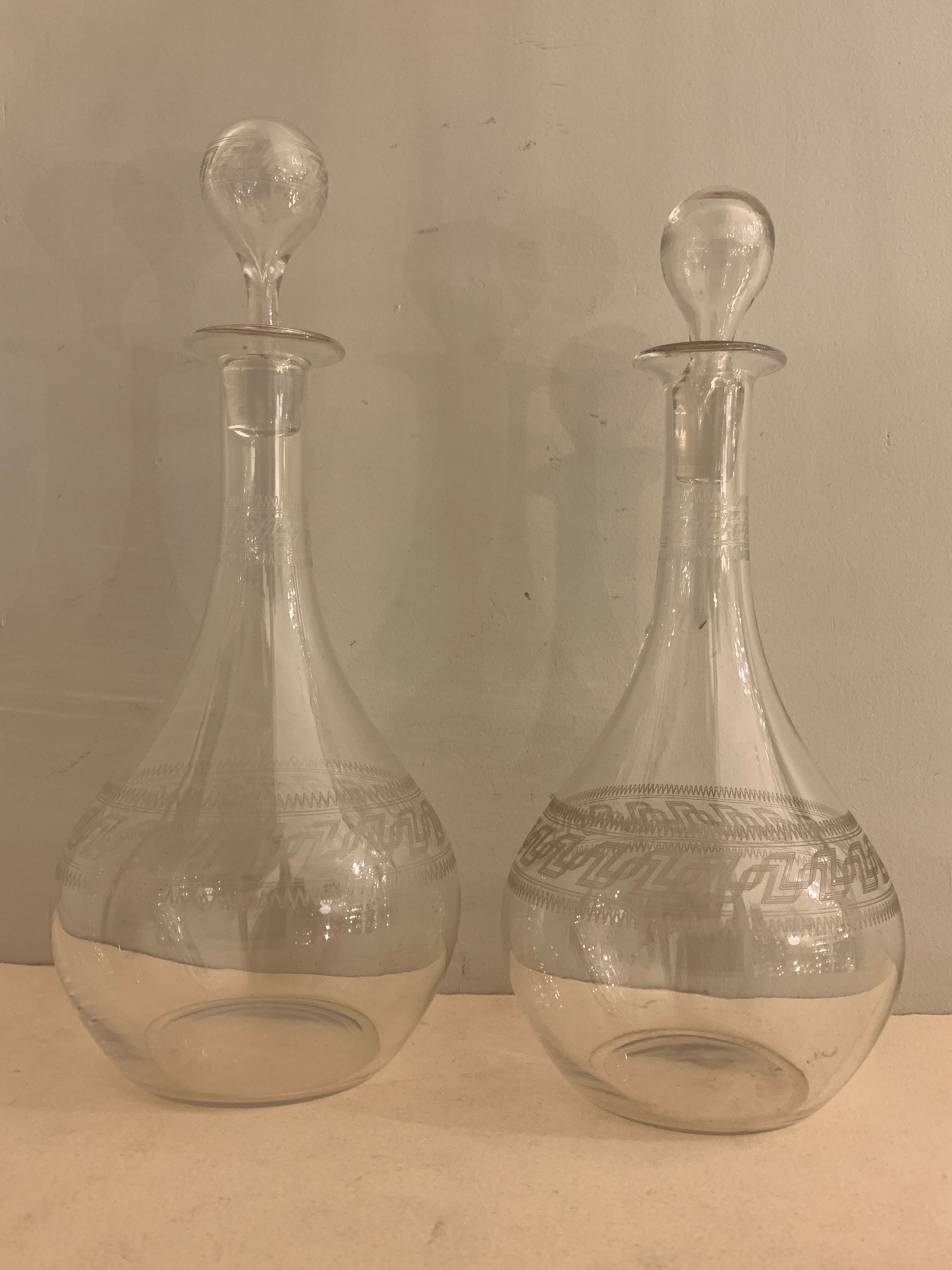 Pair of ancient decanters made of Baccarat crystal, Greek friezes