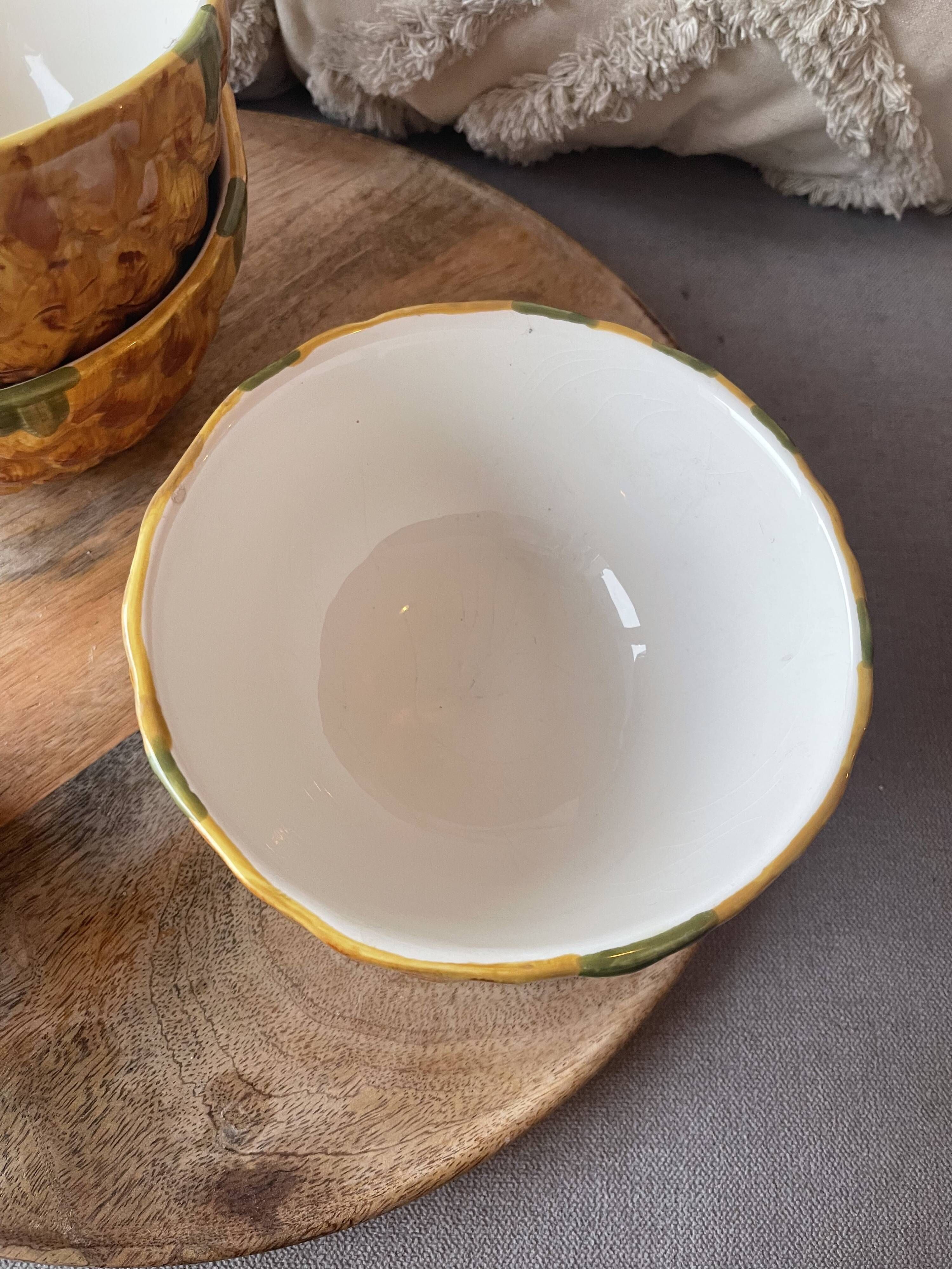 Old set of bowls and spoons in the shape of vintage pineapple