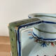 Old vase with floral motif inspired by desvres earthenware