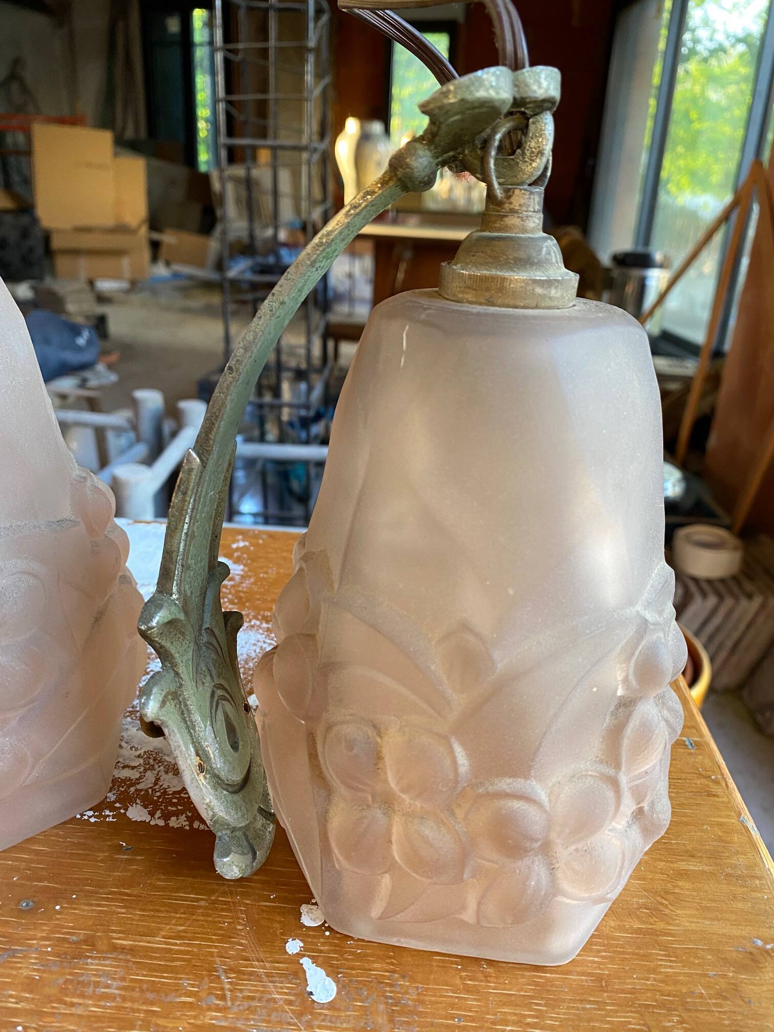 Pair of art deco silvered bronze wall lights with tulips signed ros