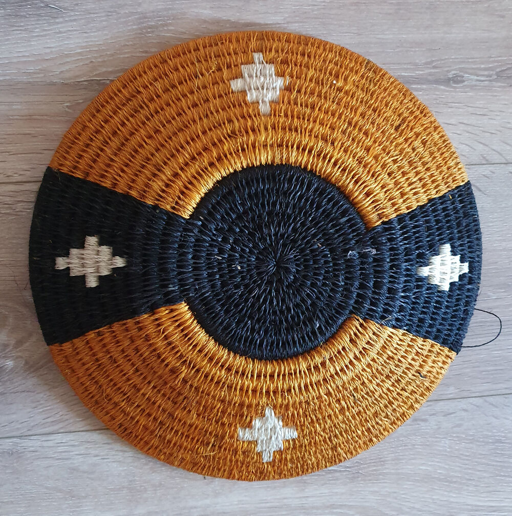 African woven wall basket, woven basket, ethnic and natural. Mr. Boswana.
