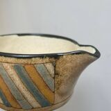 Antique milk jug.