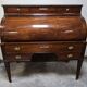 Important cylinder desk secretary in Louis XVI style made of mahogany with a system.