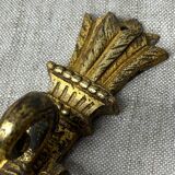 Patère en bronze, décor noeud