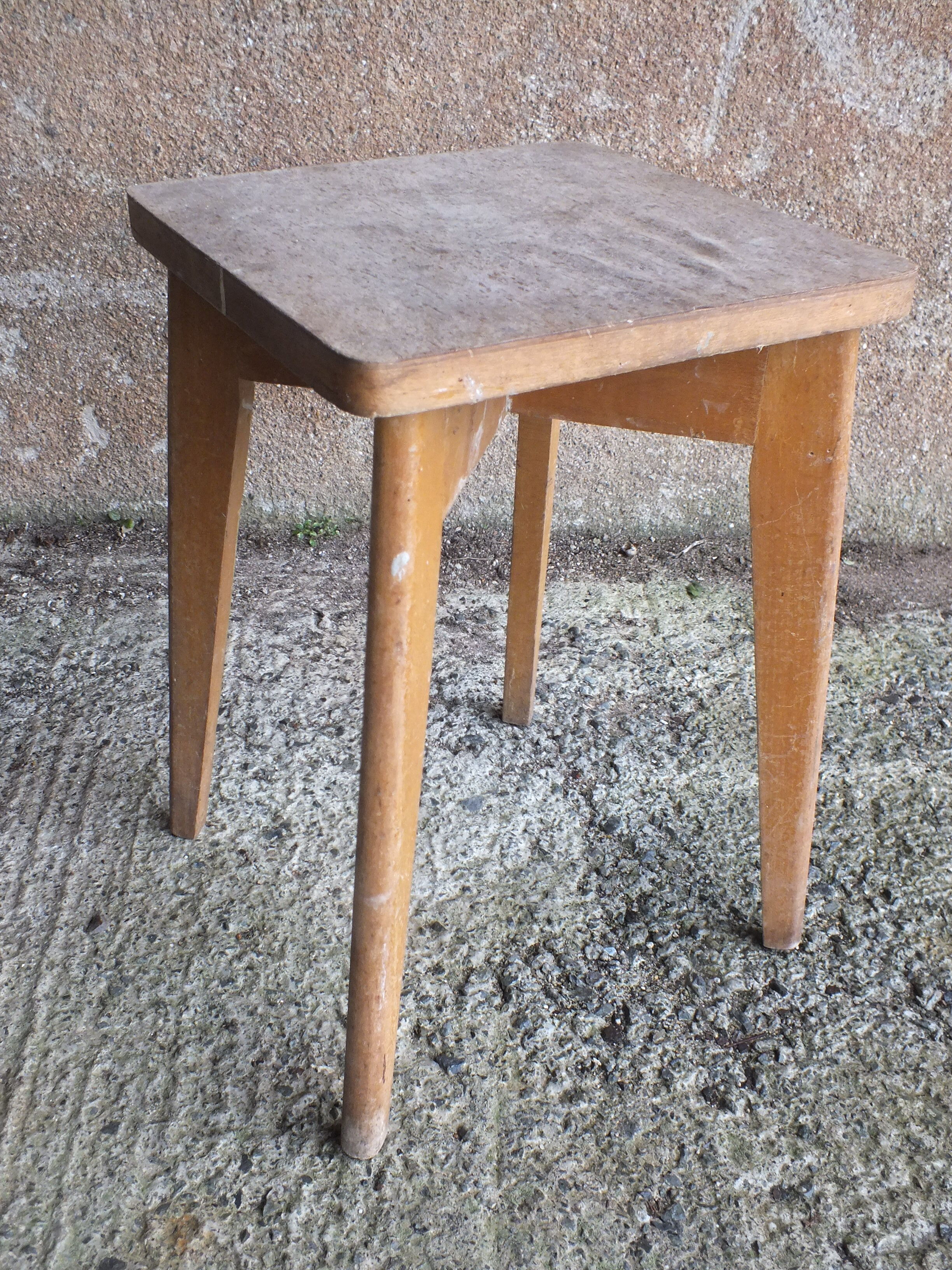 Vintage wooden stool with 4 legs from the 50s