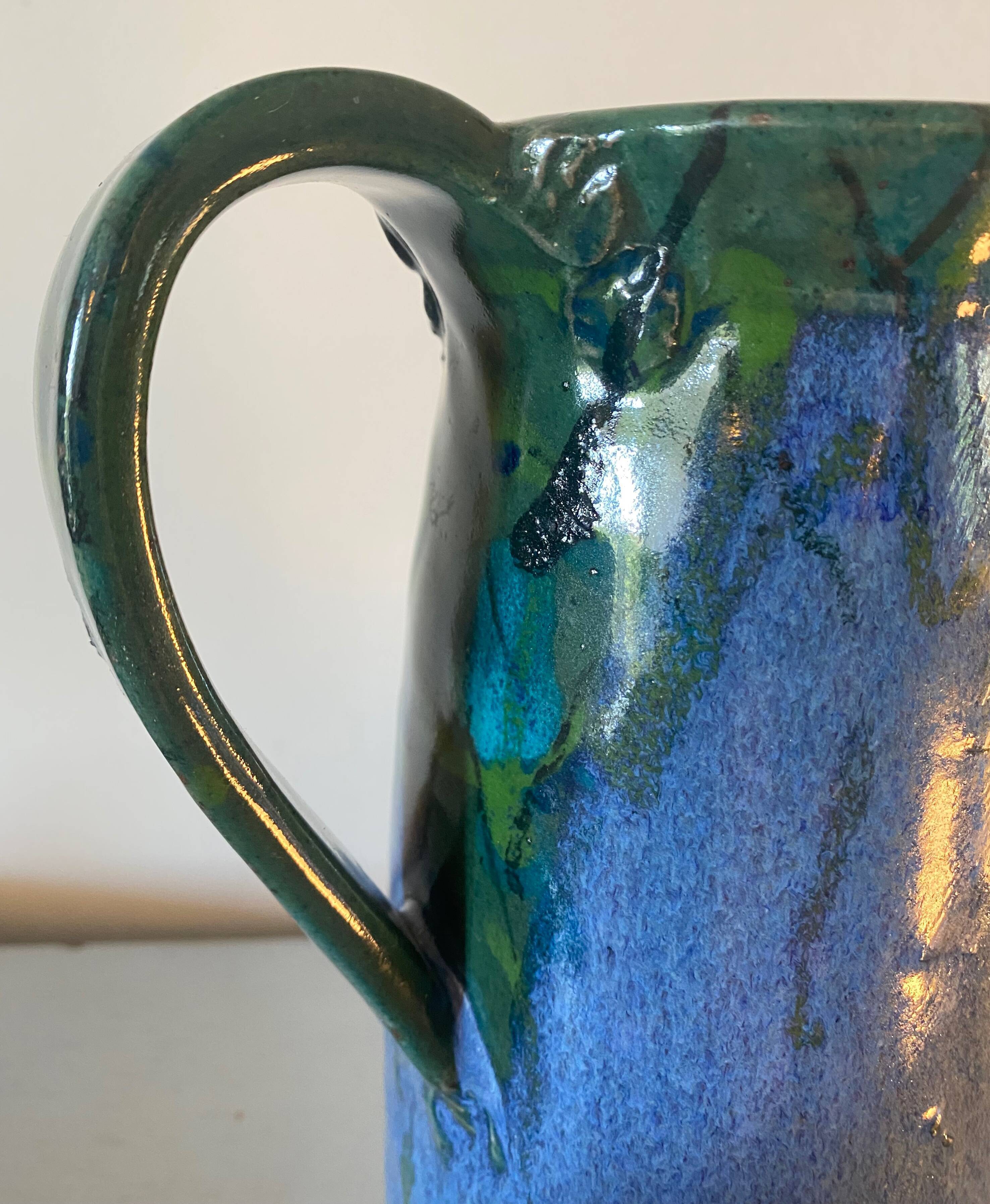 Saint clement-les-places pitcher in blue and green glazed ceramic