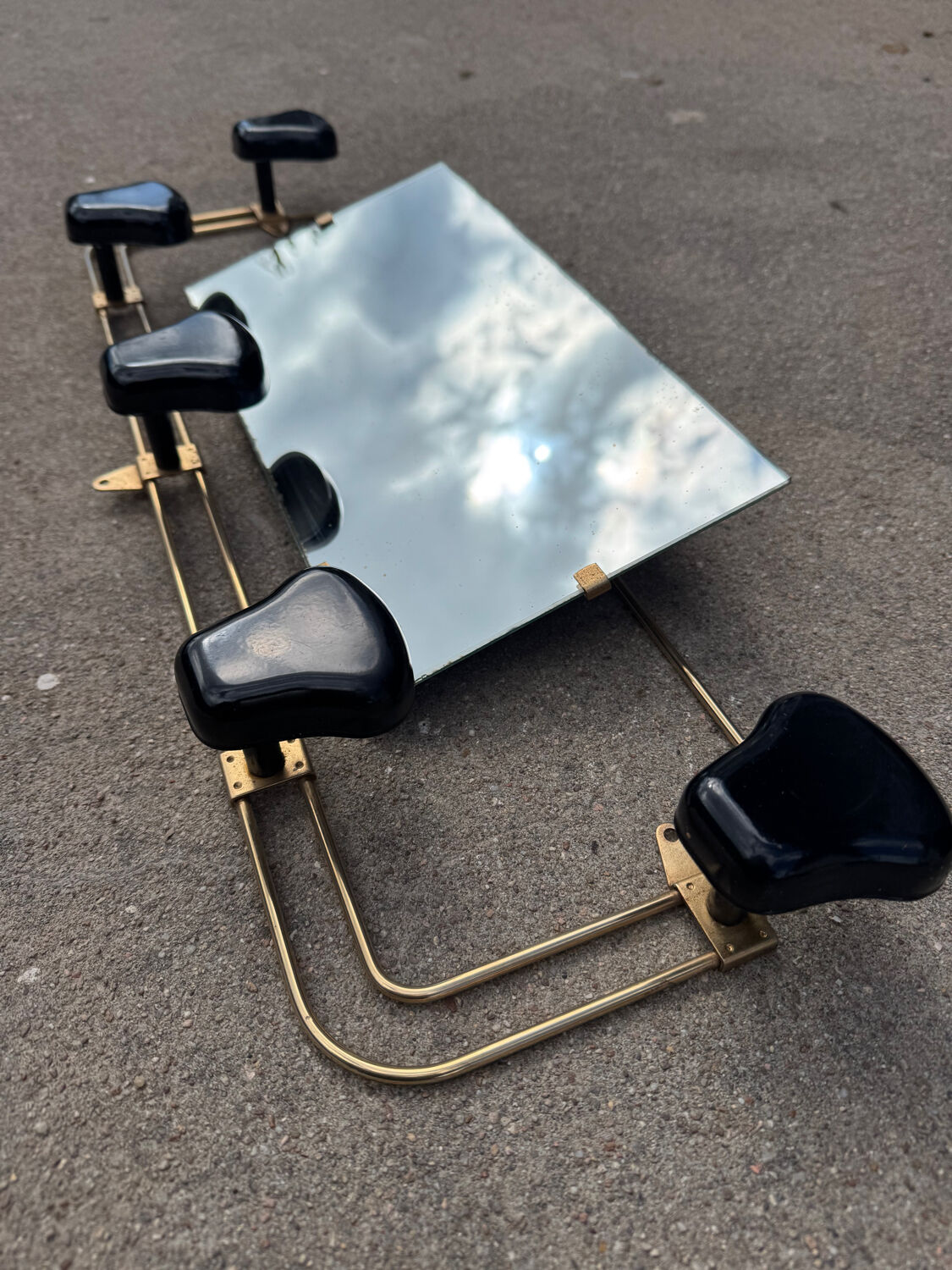 Wall-mounted coat rack mirror from the 1960s.