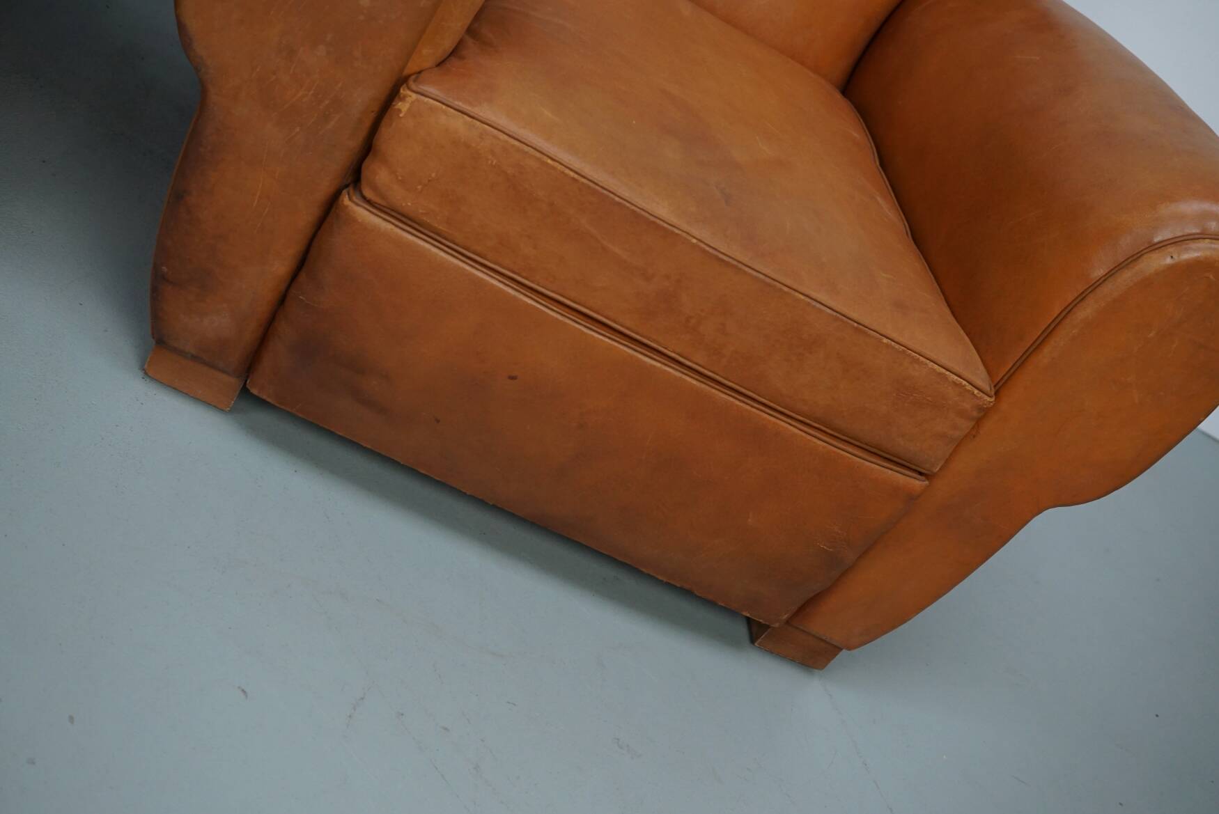 Pair of French club chairs with moustache back in cognac leather, 1950s