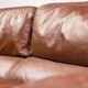 Royal 2-seater canapé premium Poltrona Frau Petronio upholstered in down and chestnut leather.