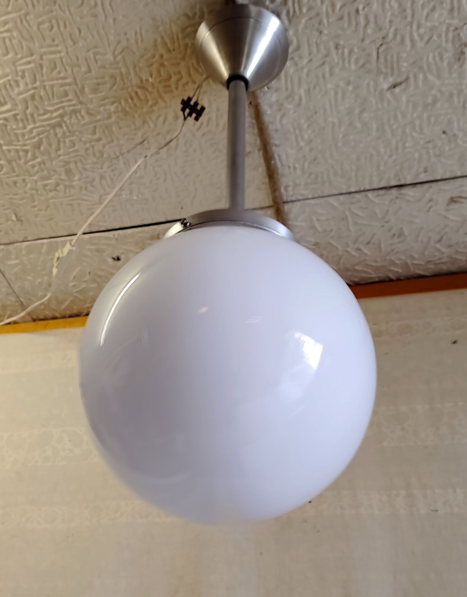 Art Deco aluminium suspension with XL opaline globe - mid 20th century.