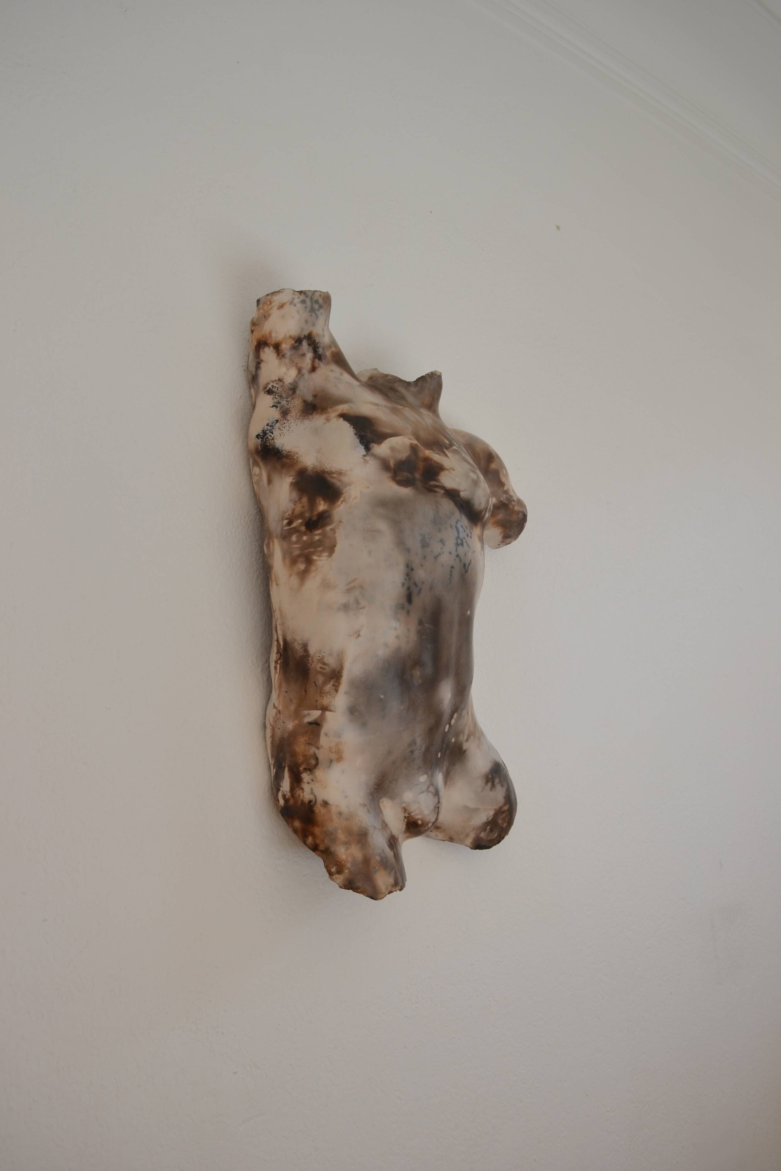 Male torso sculpture by patinated casting, signed to be identified.