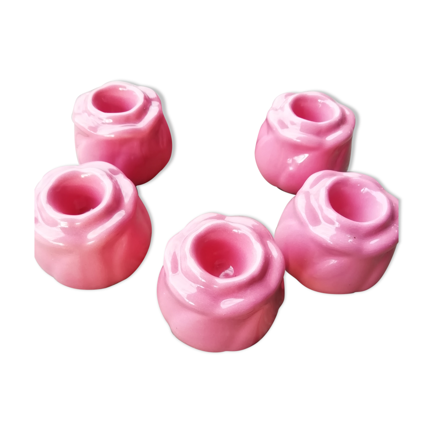 Set of candle holders shaped rosebud