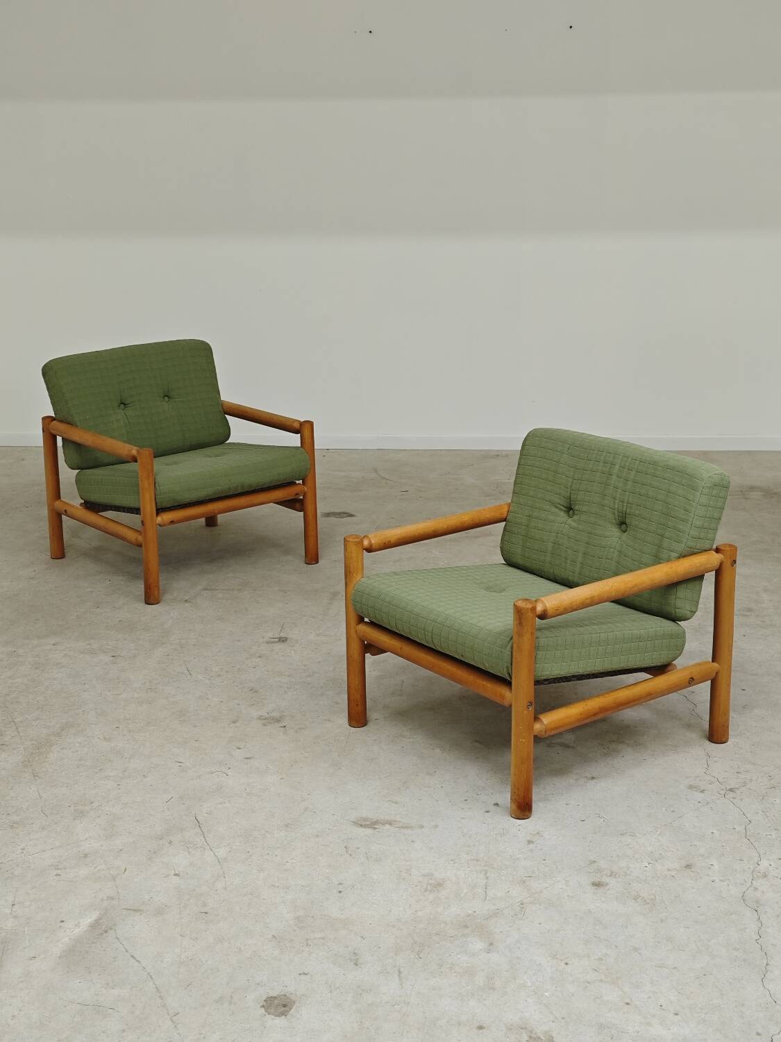 Pair of chalet style armchairs in green fabric