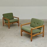 Pair of chalet style armchairs in green fabric