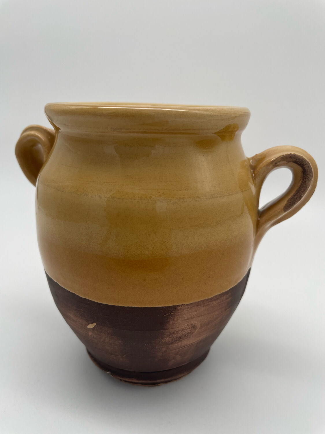 Varnished yellow terracotta confit pot