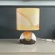 Ceramic floor lamp with a silk shade, signed.